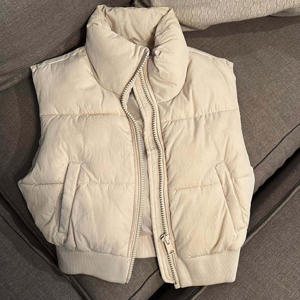 Beige puffer vest. Used